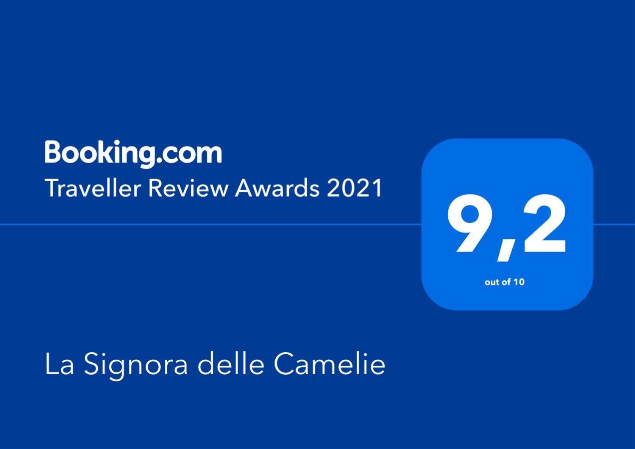 La Signora Delle Camelie Hotel Lesa Eksteriør billede