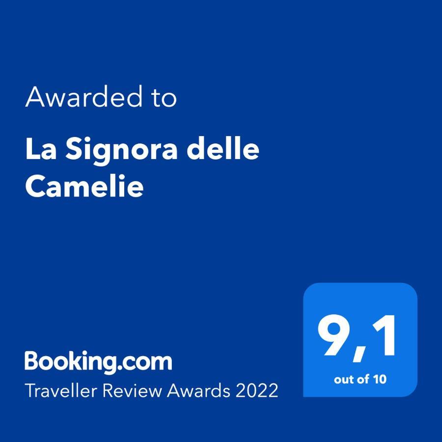 La Signora Delle Camelie Hotel Lesa Eksteriør billede